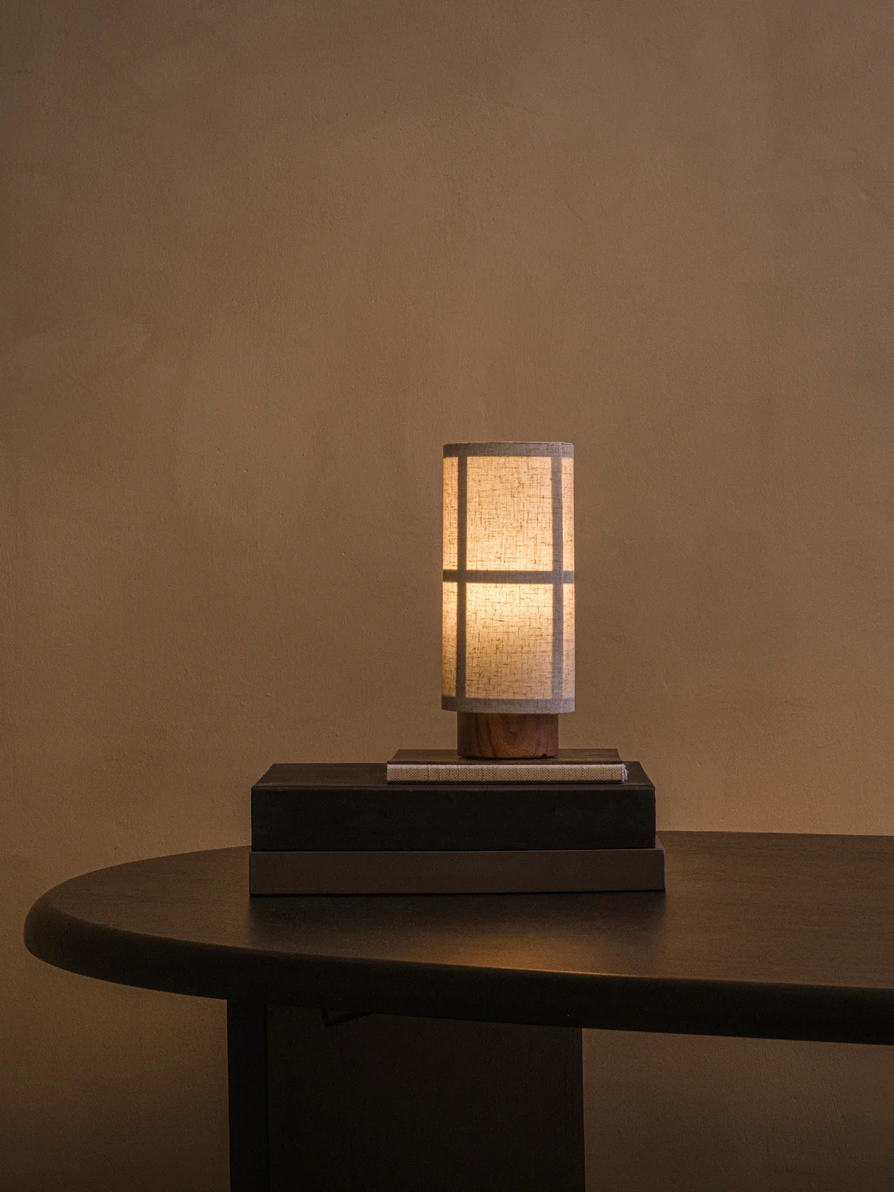 Warm lamp and desk composition by Audo Copenhagen